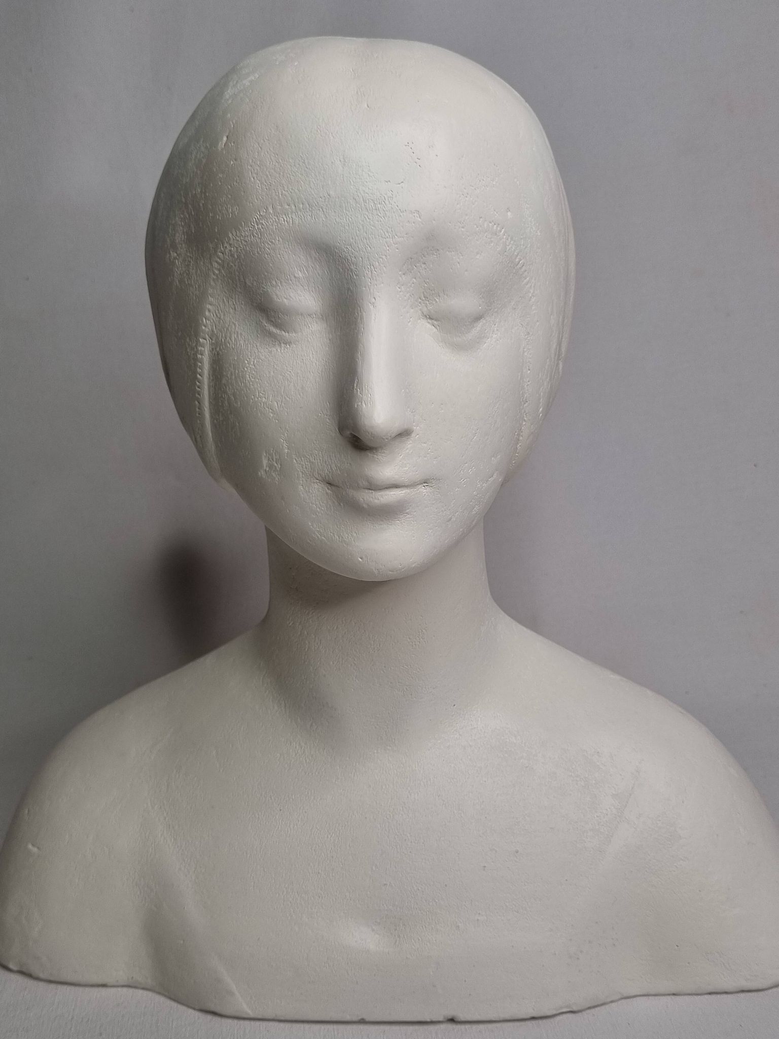 Bust after Laurana in Renaissance style, known as Aragon, patinated plaster, 33 cm.
