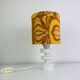 Temde lamp with turned wood and a seventies lampshade.