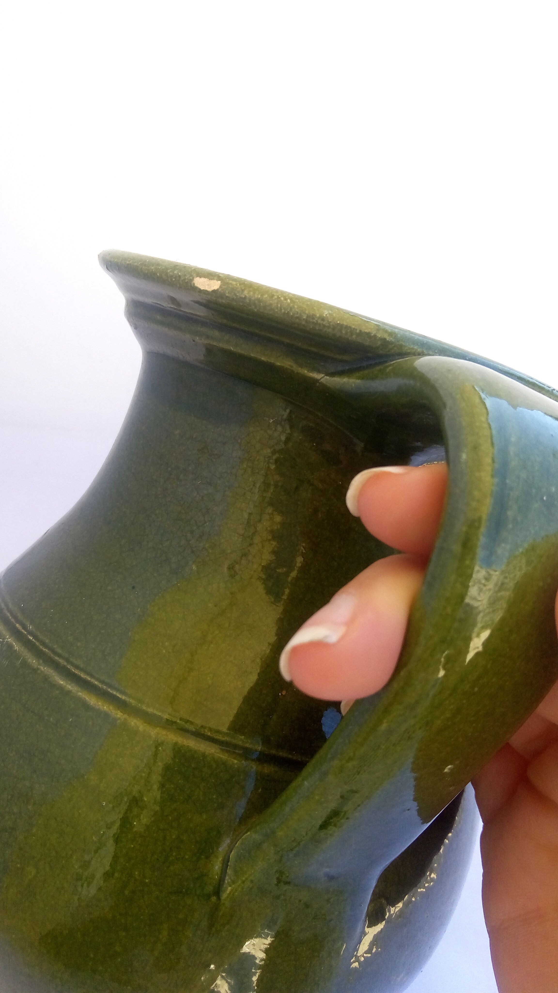 Green ceramic pitcher
