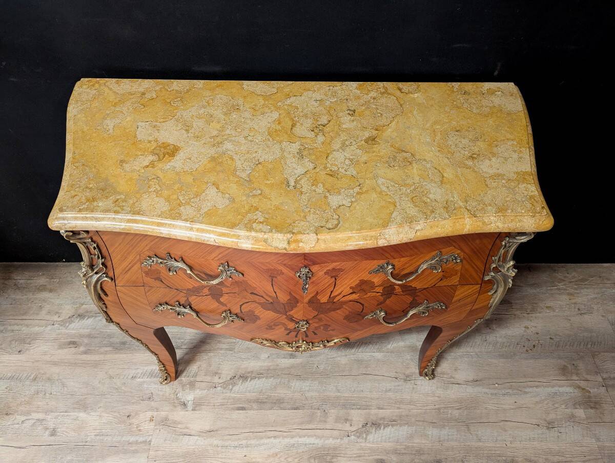 Louis XV style commode with marquetry and its pair of bedside tables.