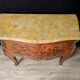 Louis XV style commode with marquetry and its pair of bedside tables.