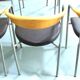 Série de 6 fauteuils danois en inox, et bois, assises en cuir marron foncé des années 1990