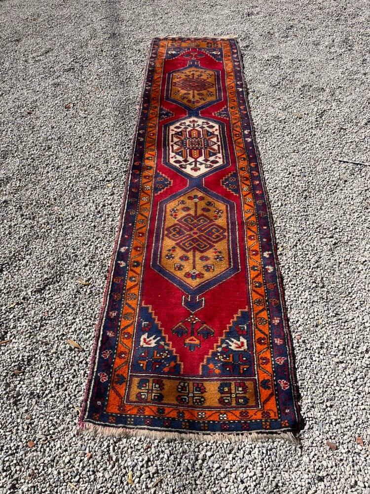 Long antique Persian carpet