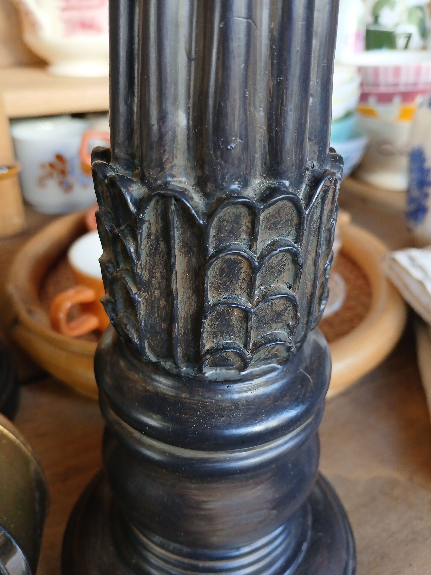 2 carved wooden candlesticks