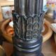 2 carved wooden candlesticks