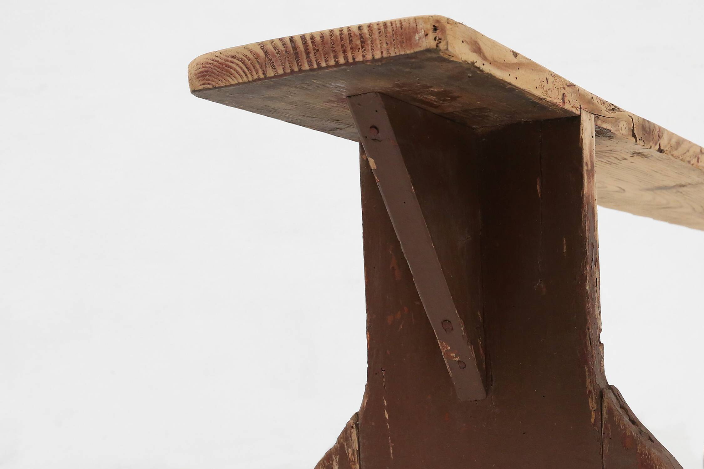Rustic wooden bench in with brown painted feet, France ca. 1890