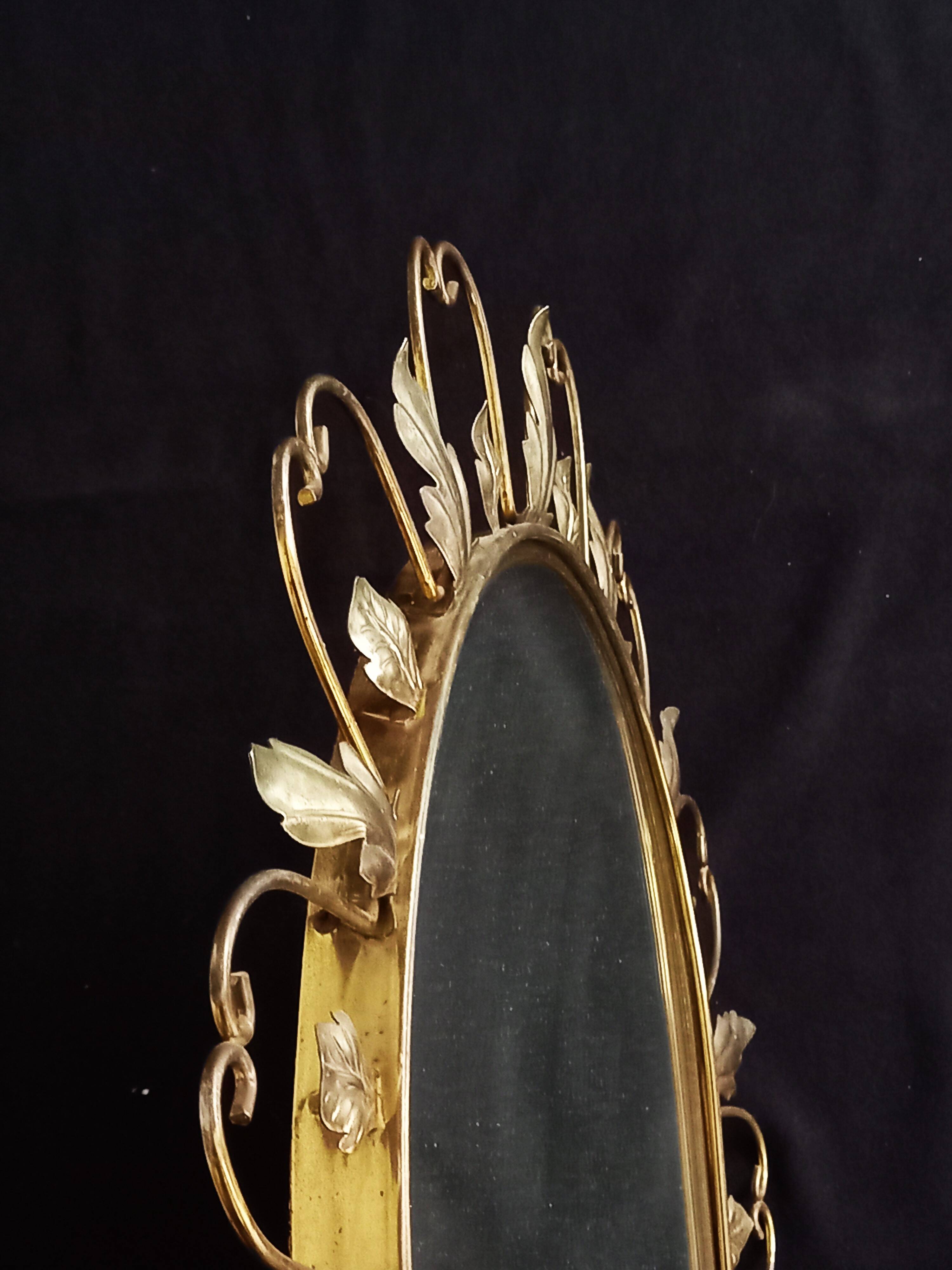 Large arched mirror with acanthus leaves and scrolls in gold metal from deknudt, 1960s