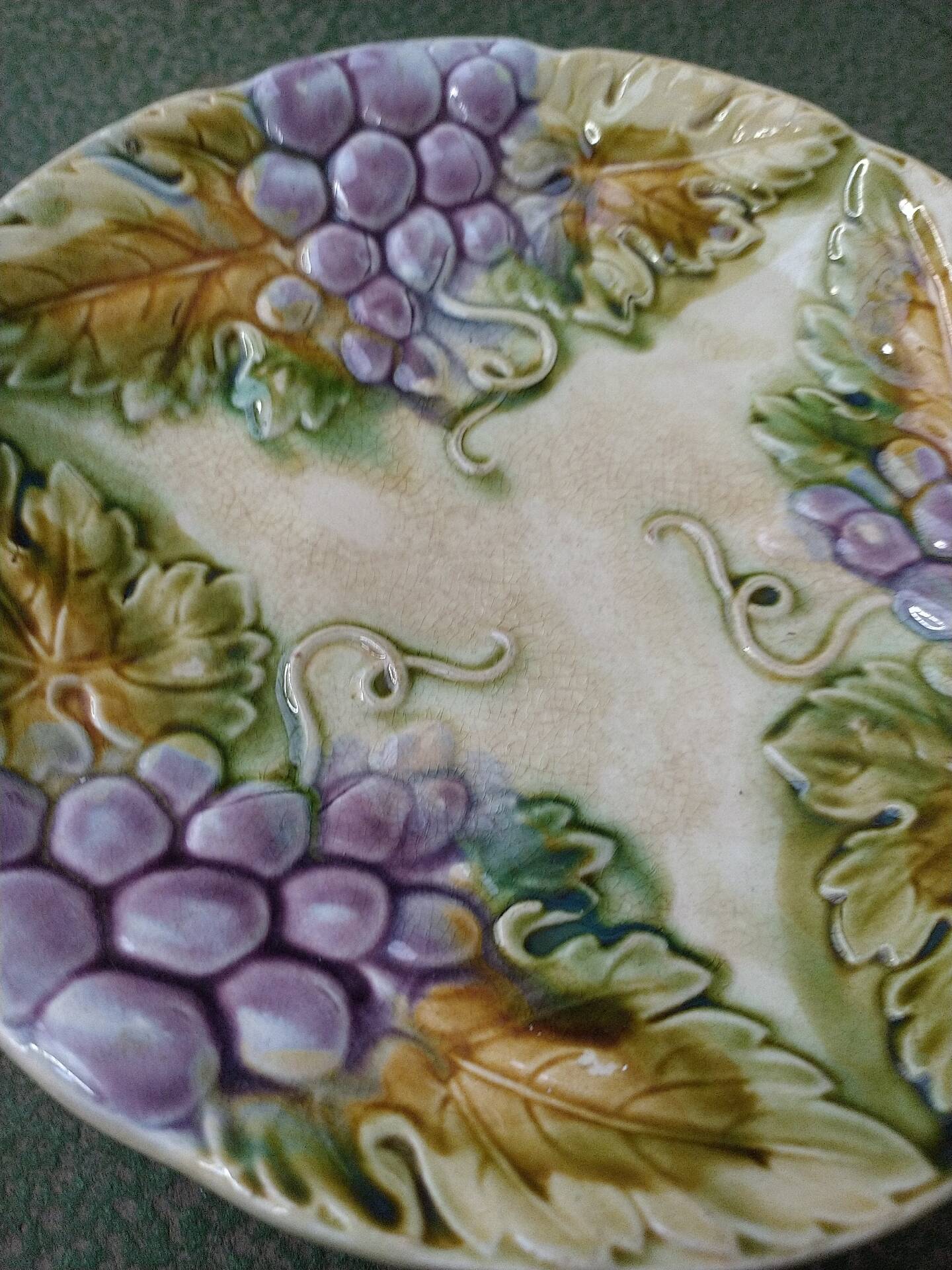 Slipware plates with vine decoration.
