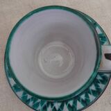 Coffee cup and small milk jug