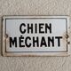 Old enamelled plaque "Wicked Dog"