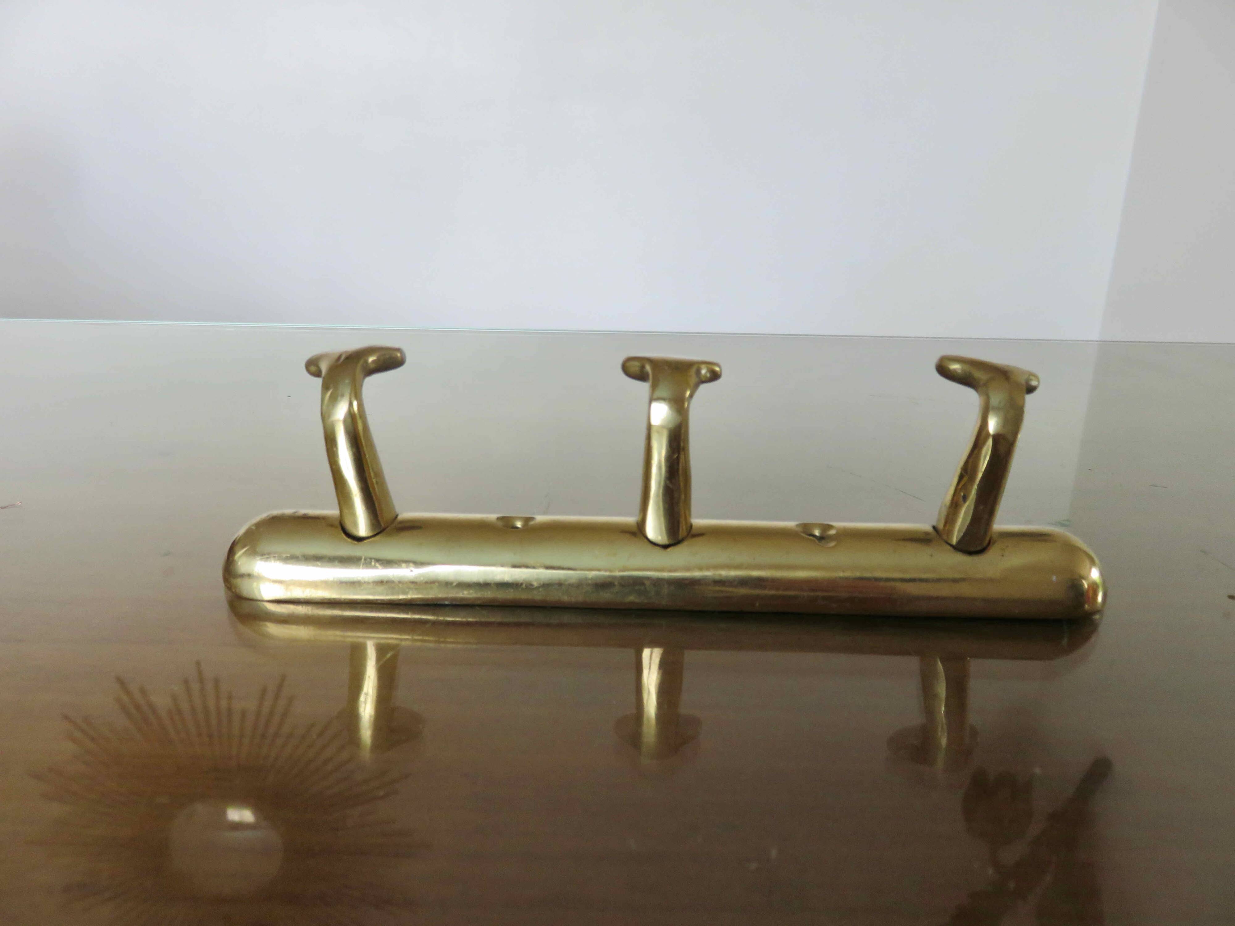 Brass tea towel holder