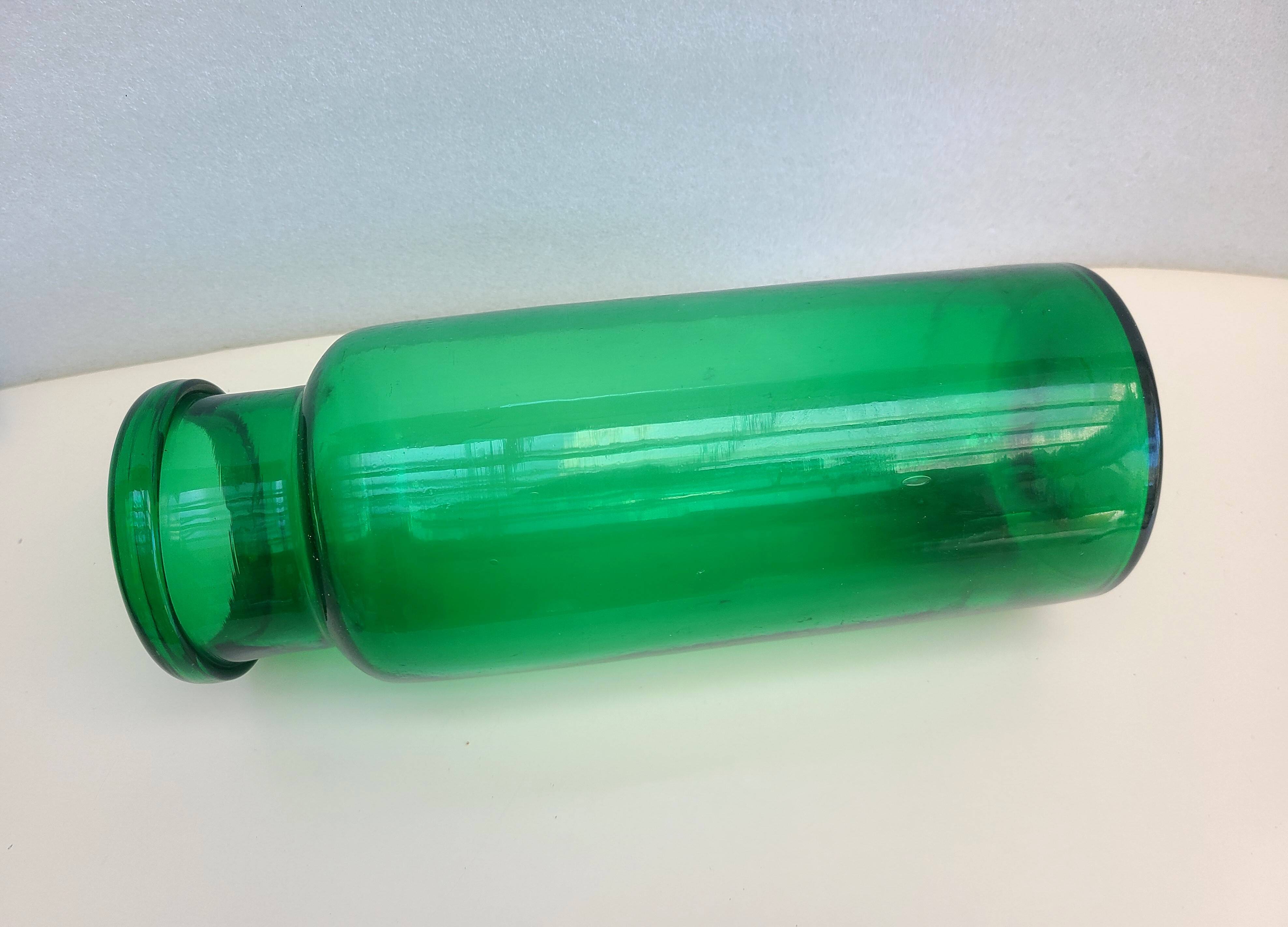 Antique green glass pharmacy jar