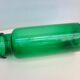 Antique green glass pharmacy jar