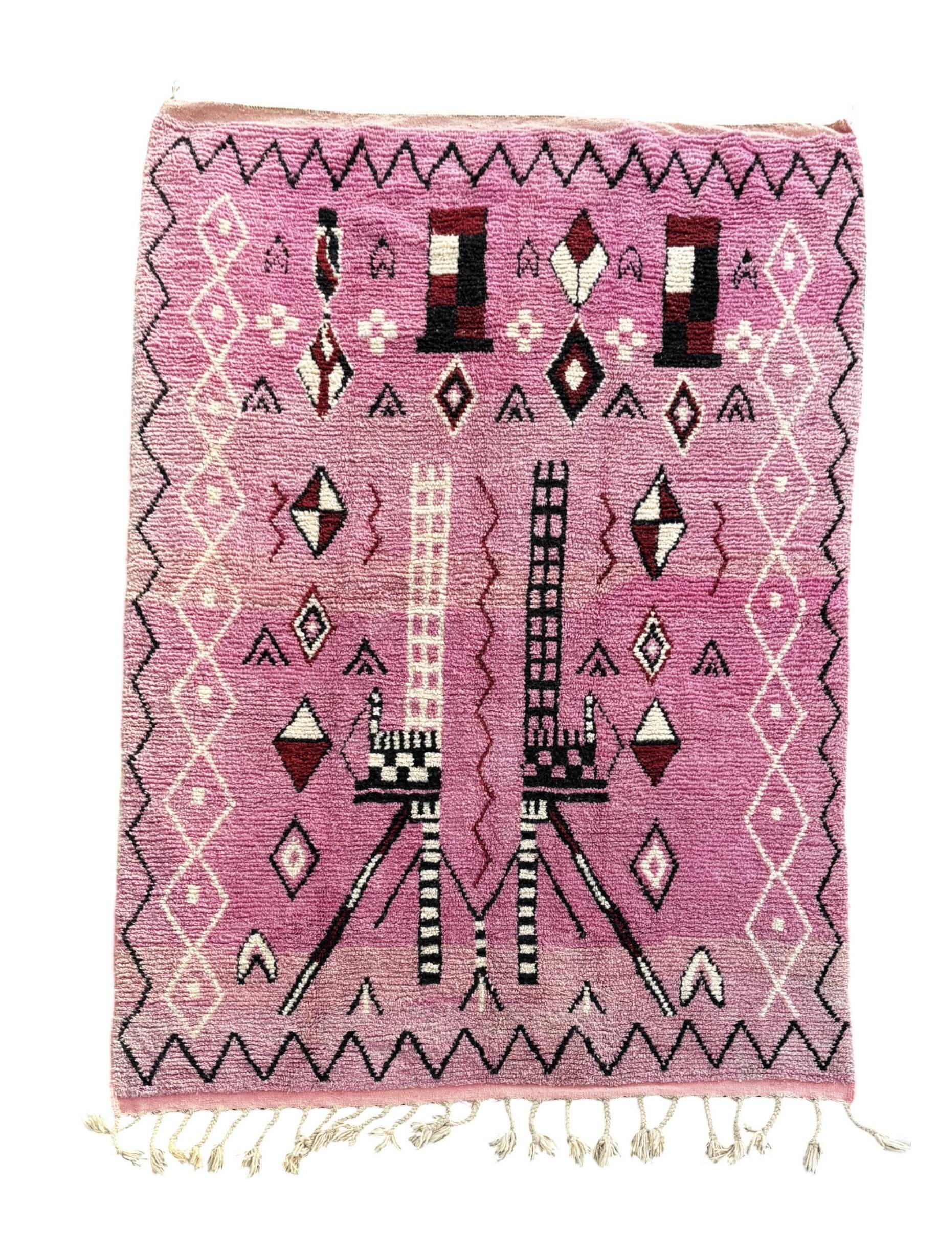Berber Moroccan pink carpet made of wool in Morocco.