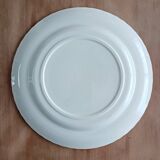 Round antique earthenware dish with floral decoration