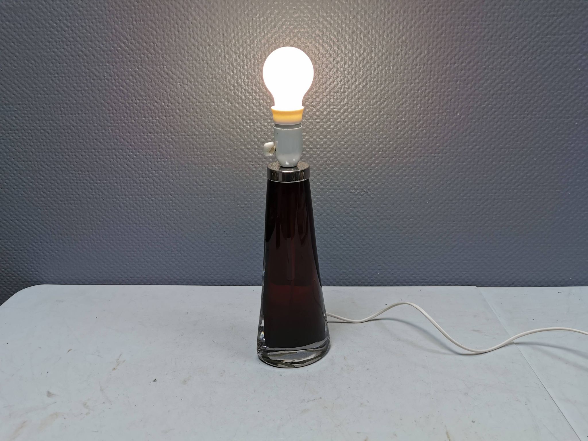 Table lamp by Carl Fagerlund for Orrefors Glassworks Sweden 1960s in translucent and deep red glass.