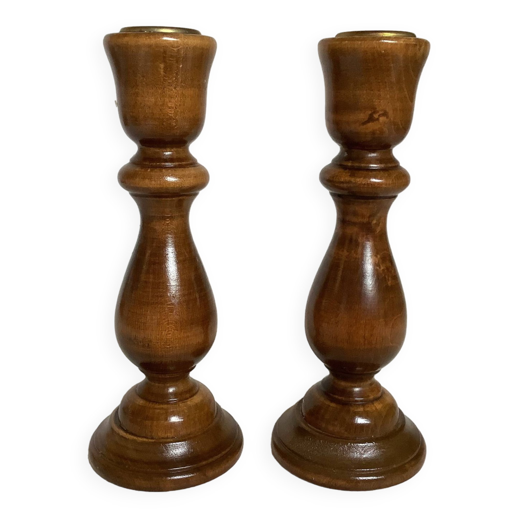 Pair of varnished wooden candlesticks