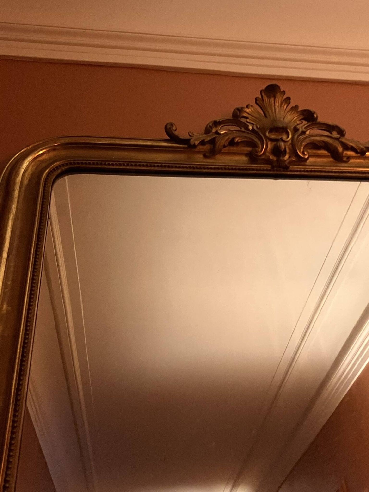 Antique gilded wooden mirror