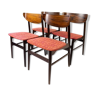 Ensemble de quatre chaises de salle à manger en palissandre et rembourré de tissu rouge, de design danois, années 1960