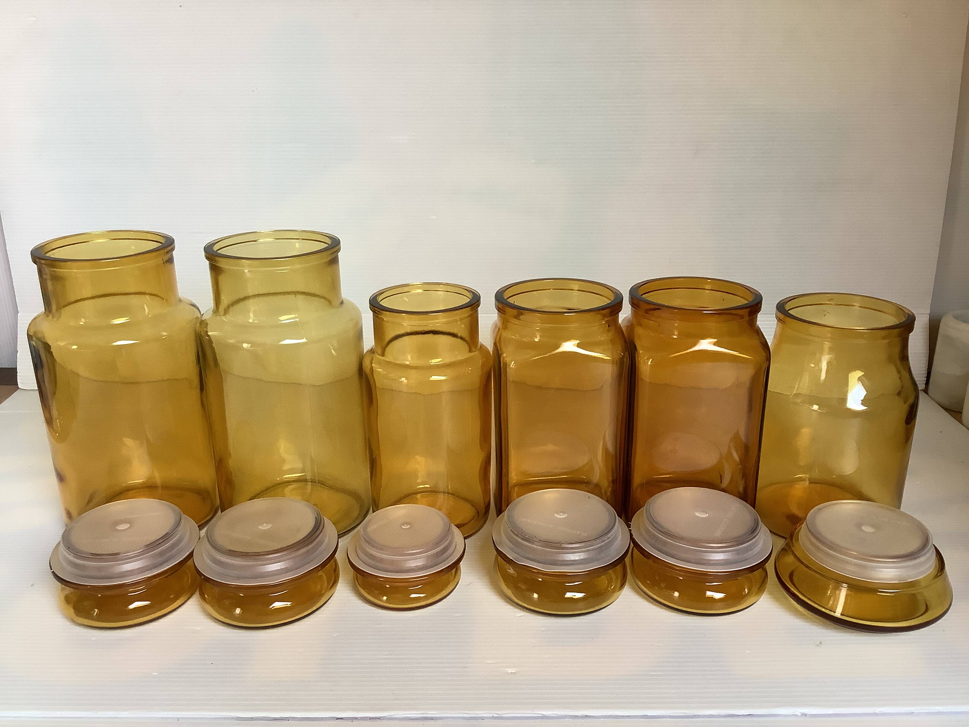 Six yellow glass candy jars from the 70s
