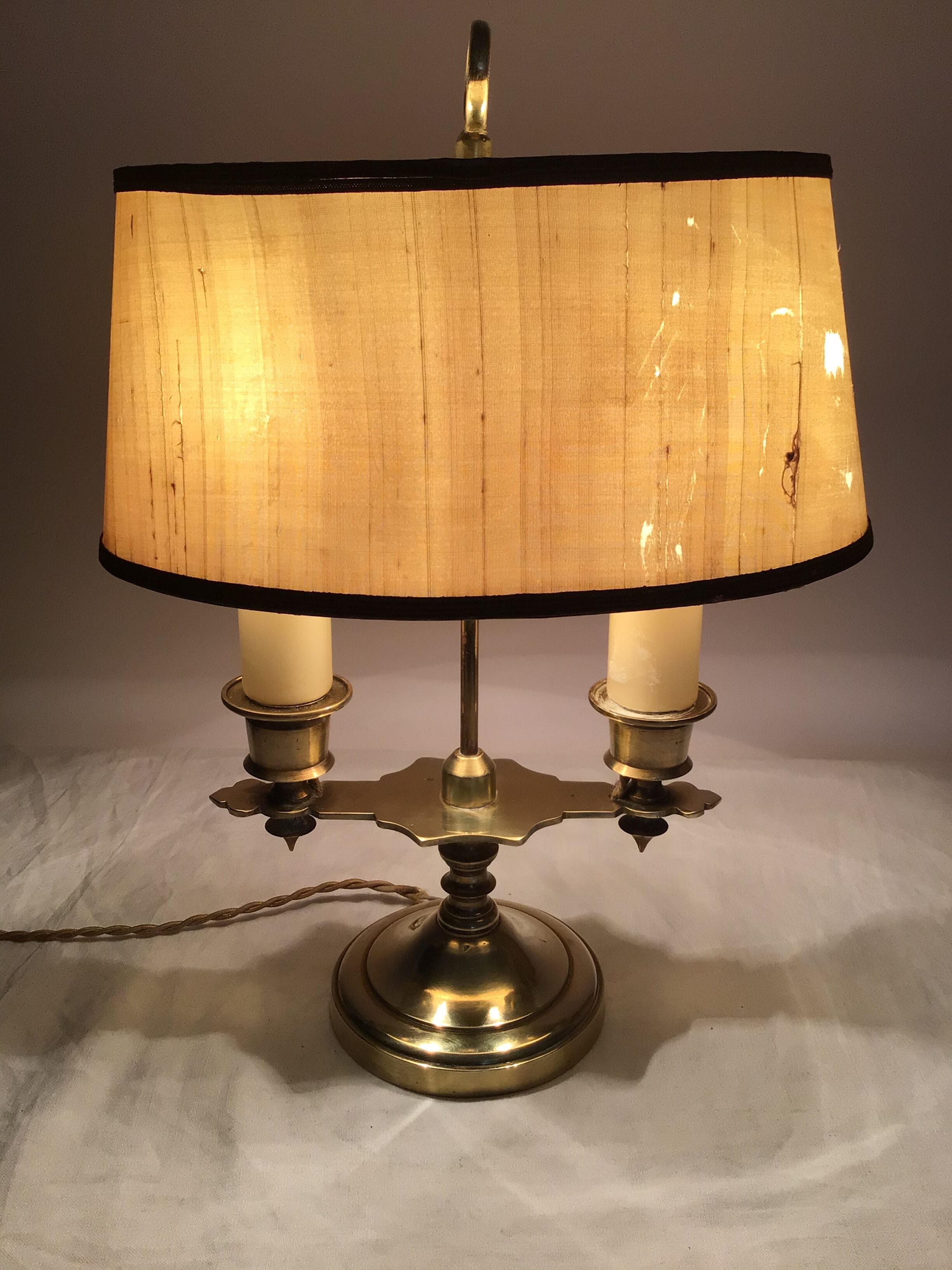 Old golden brass hot water bottle lamp with 2 arms of light