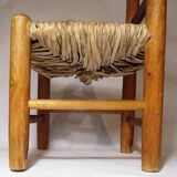 Old child chair in wood and straw
