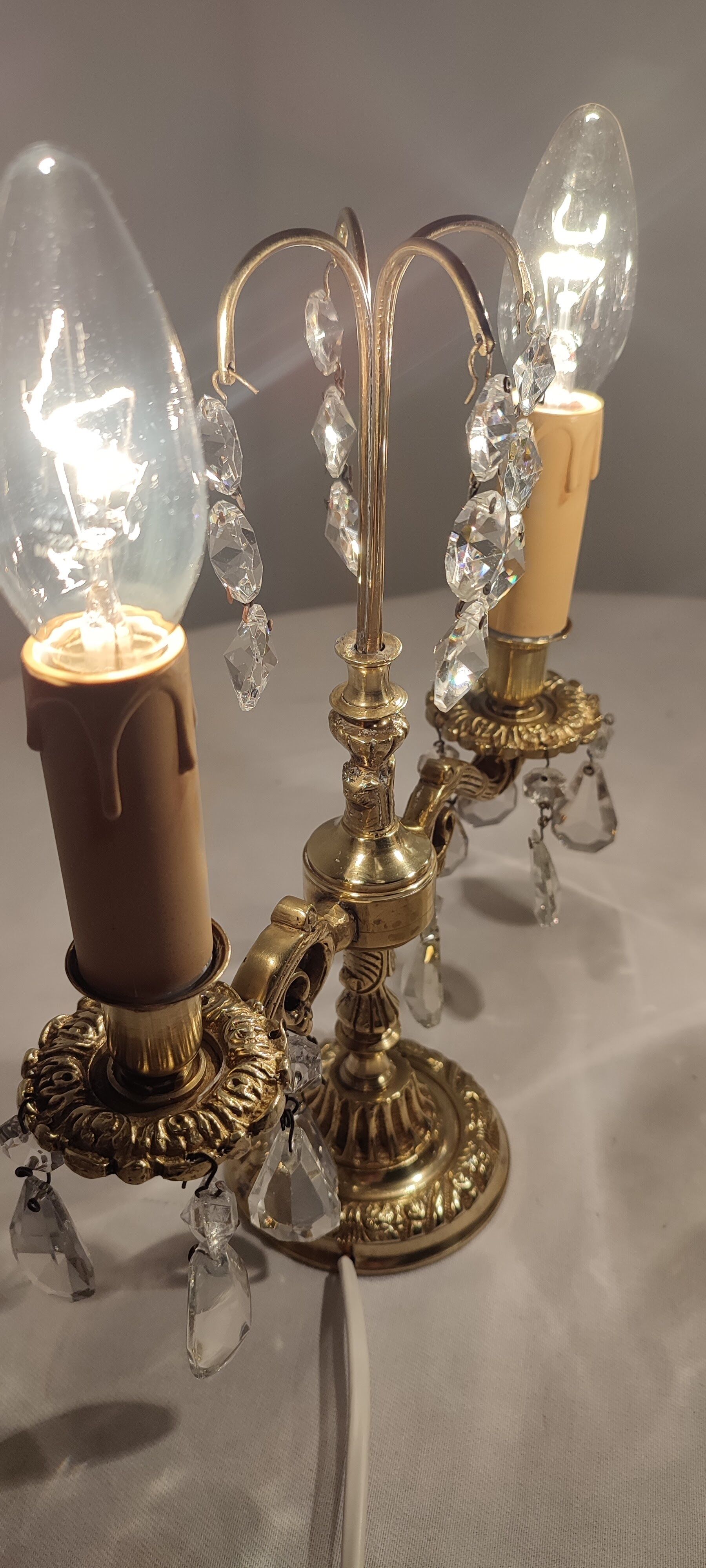 Classic bronze and crystal sconces. France 1950s.