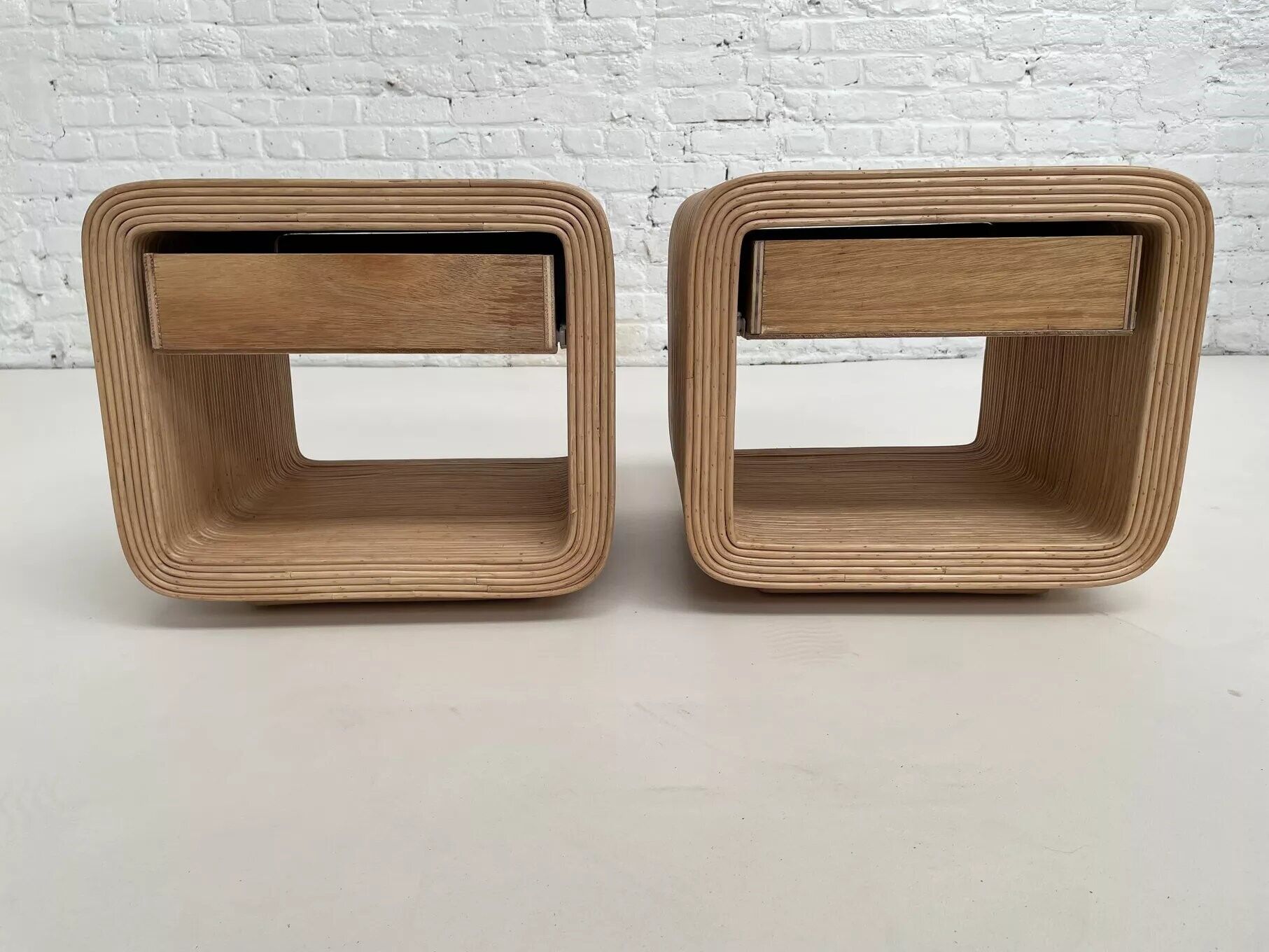 Pair of rattan bedside tables