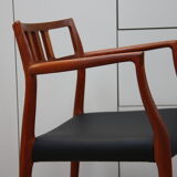 Vintage armchair in teak and black leather - Model 64 - Möller - Denmark '60's