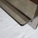 Smoked glass coffee table, brushed stainless steel base, 1970s.