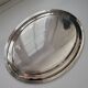 Large oval serving platter in silver-plated metal by Ravinet d'Enfert.