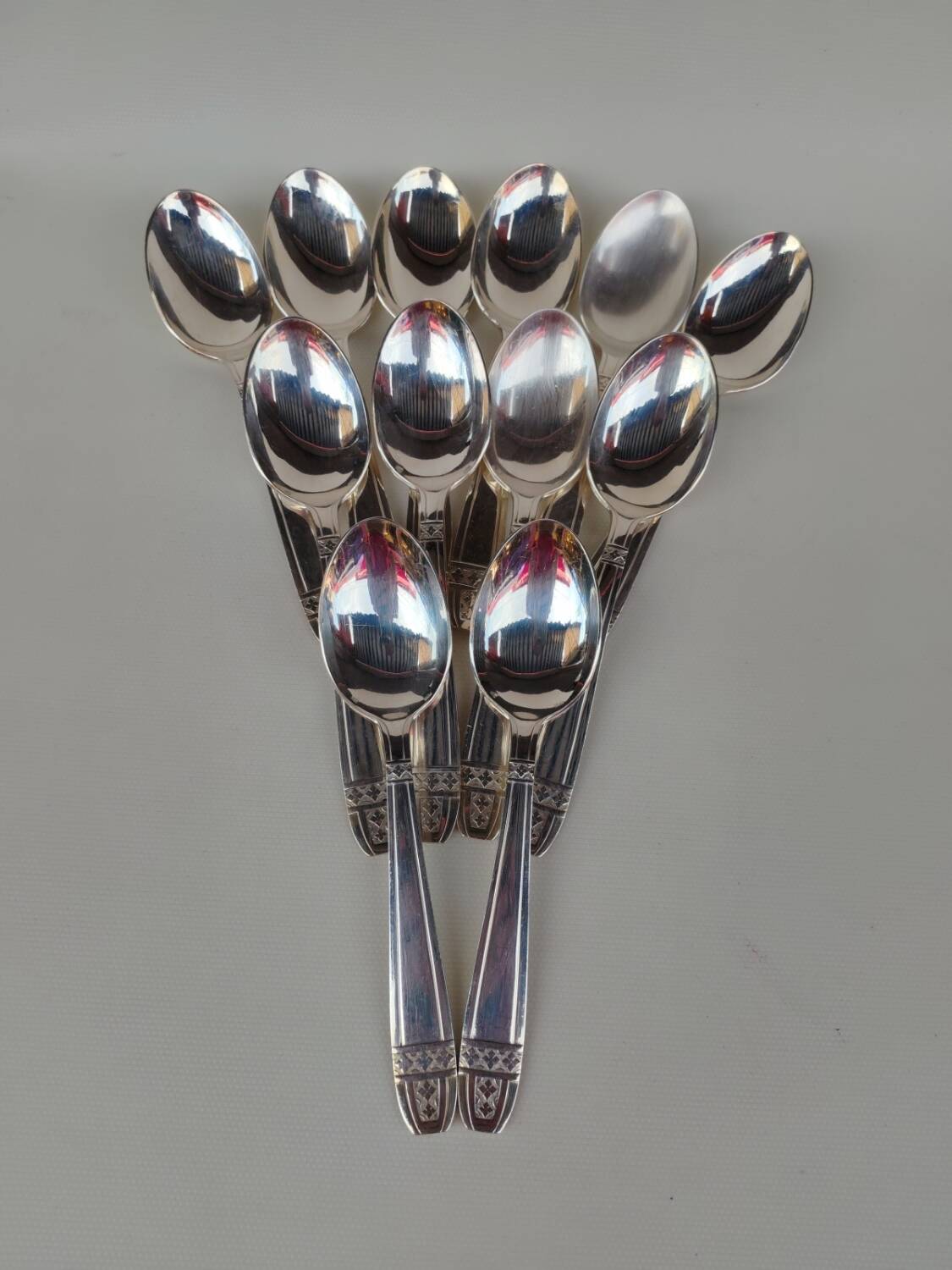 12 silver-plated soup spoons, Monaco Grand Prix model.