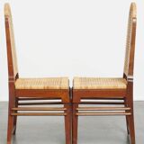 4 wooden Art Deco design dining chairs with a wicker seat and backrest