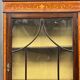Vitrine édouardienne en acajou avec incrustation et marque "Bon Marche"