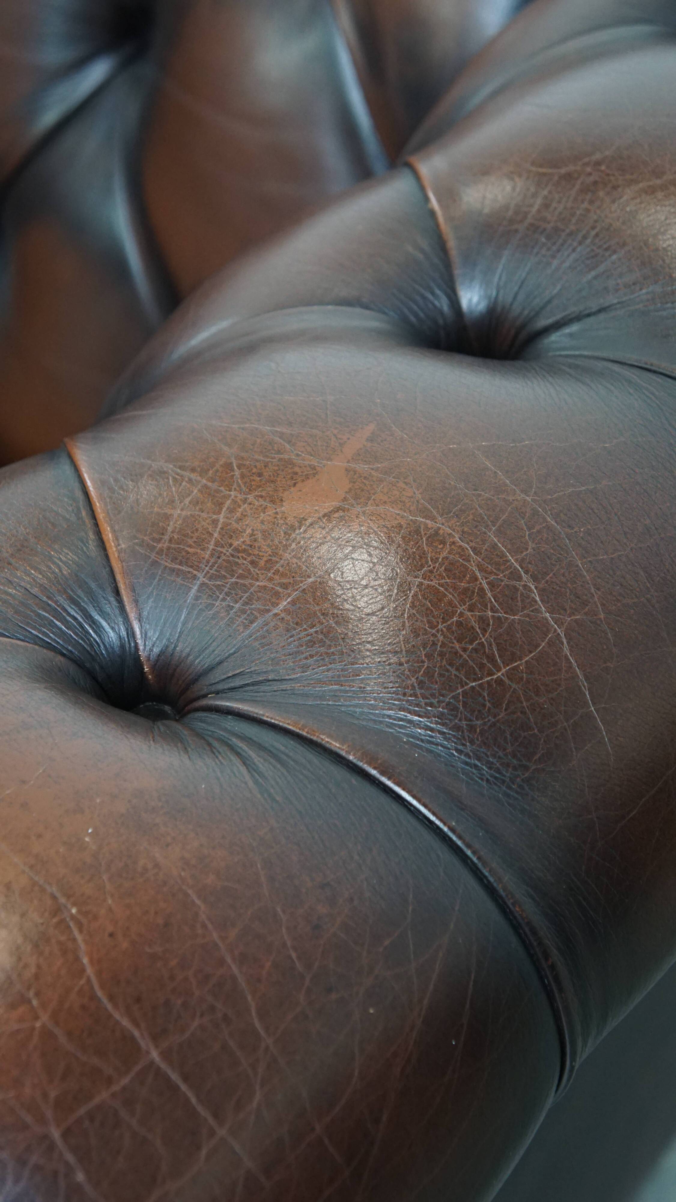 Dark brown English cowhide leather chesterfield armchair
