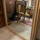 Giled and black fireplace mirror