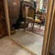 Giled and black fireplace mirror