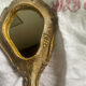 Patinated wooden Florentine hand mirror