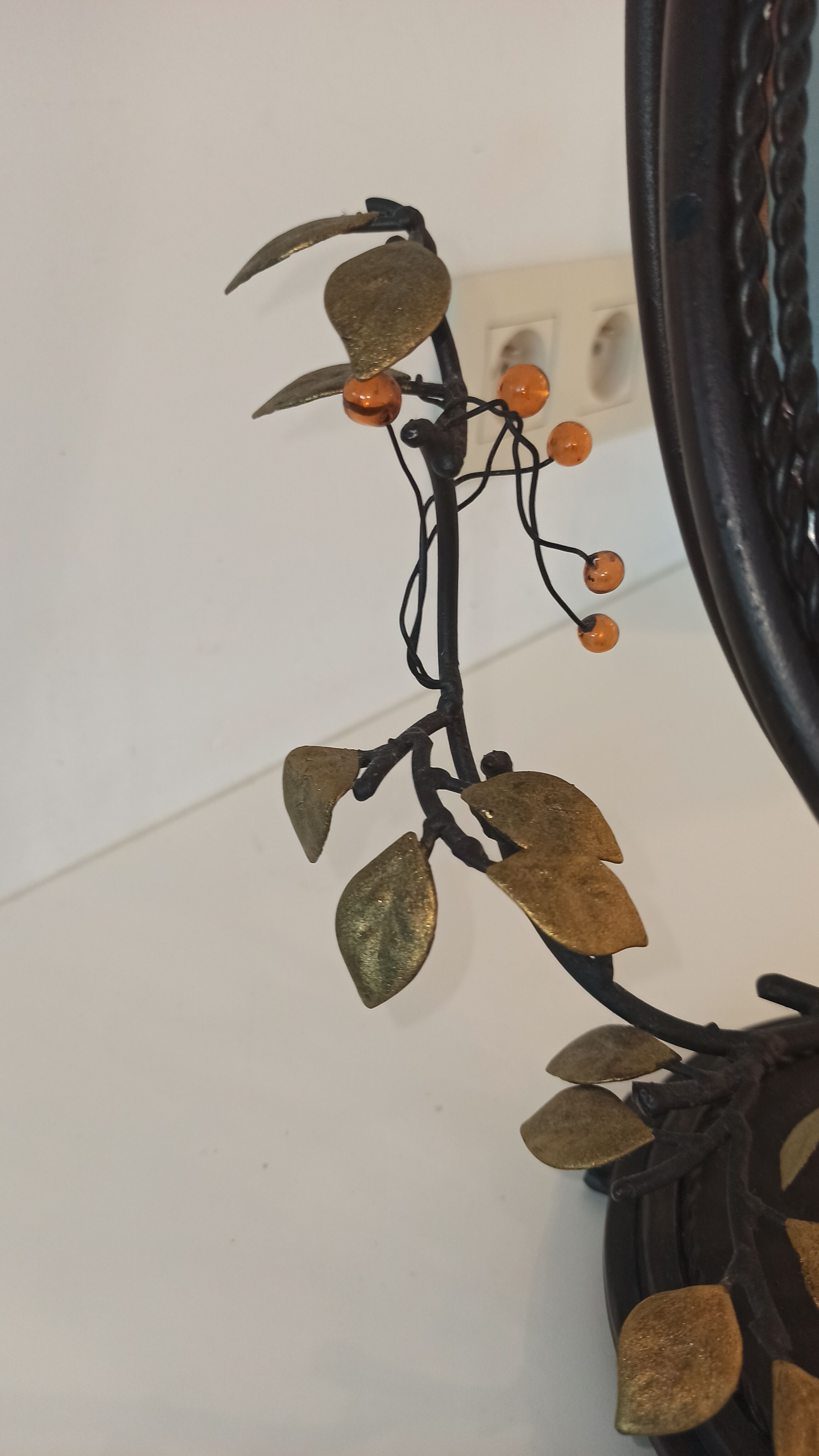 Table mirror, tilting psyche in patinated bronze decorated with leaves and fruits