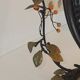 Table mirror, tilting psyche in patinated bronze decorated with leaves and fruits