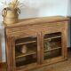 Old glass-fronted Parisian buffet in raw solid wood