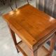 Occasional table in cherry wood, 1 drawer, 1 cane shelf, 1950.