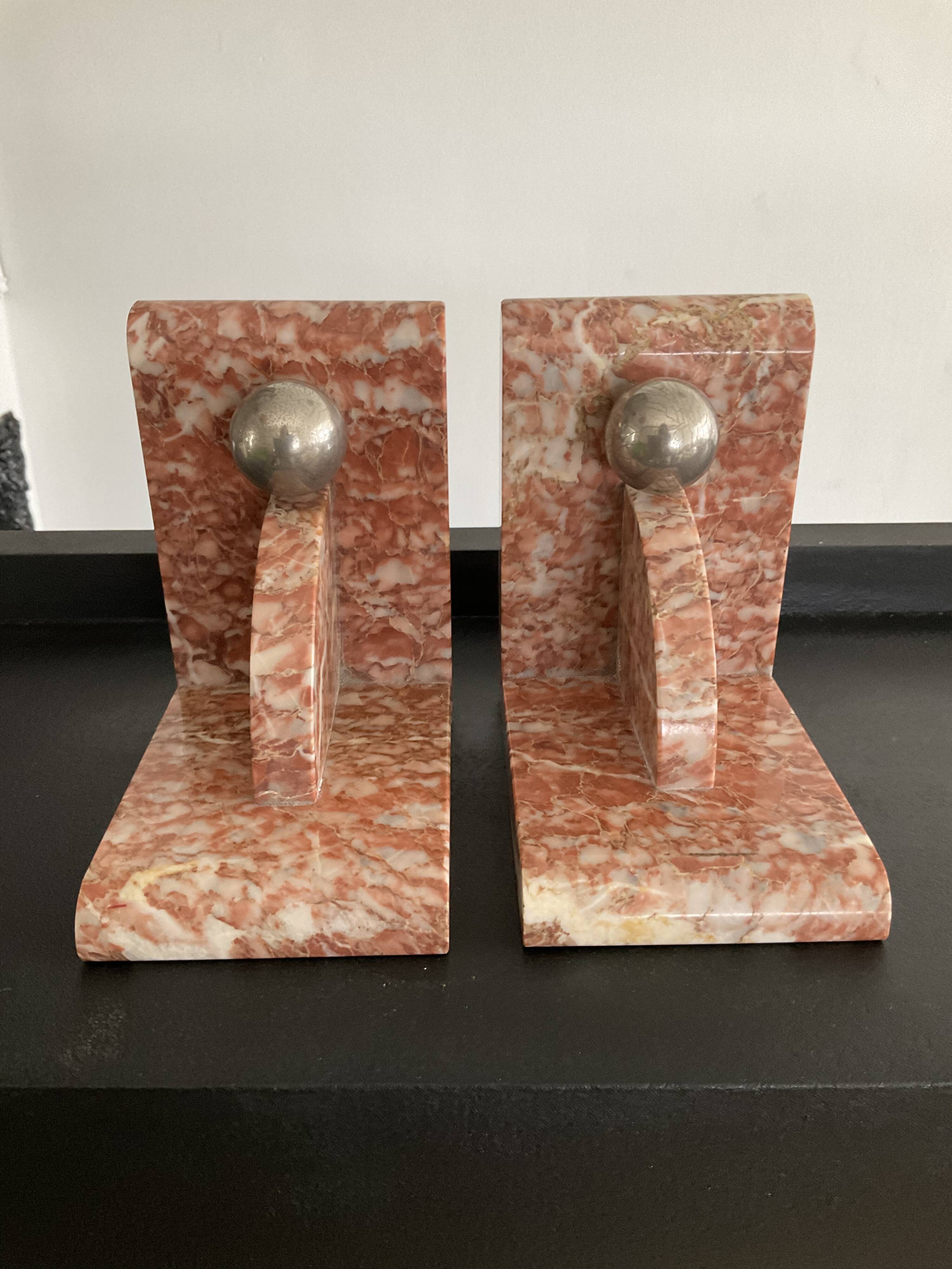 Pair of art deco series-books in marble and brass