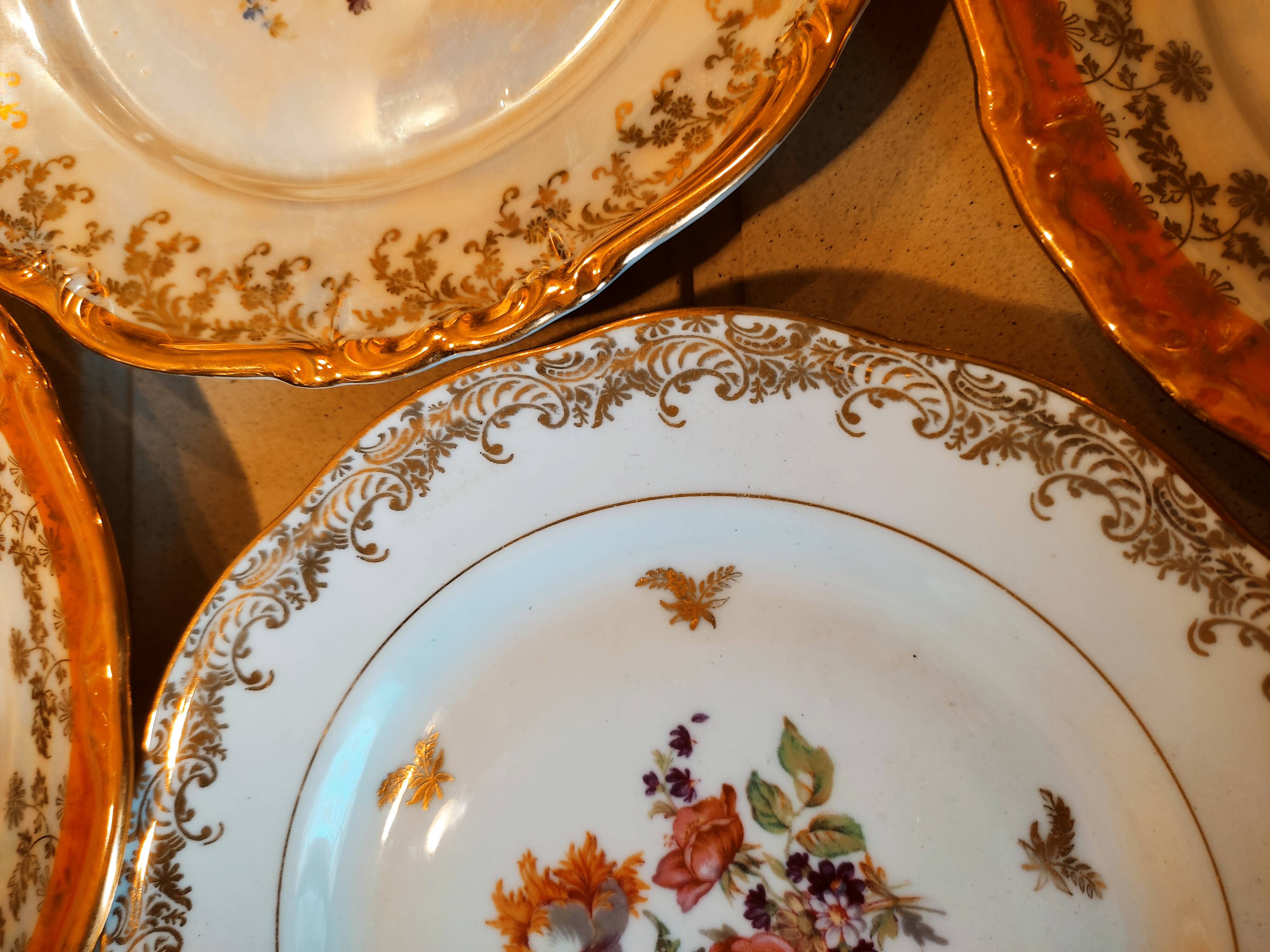 6 mismatched dessert plates decorated with roses