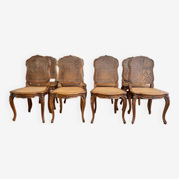 Suite de 8 chaises de style Louis XV en cannage