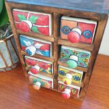 Vintage box with wood and ceramic drawers