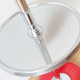 Orange standing ashtray with shelf