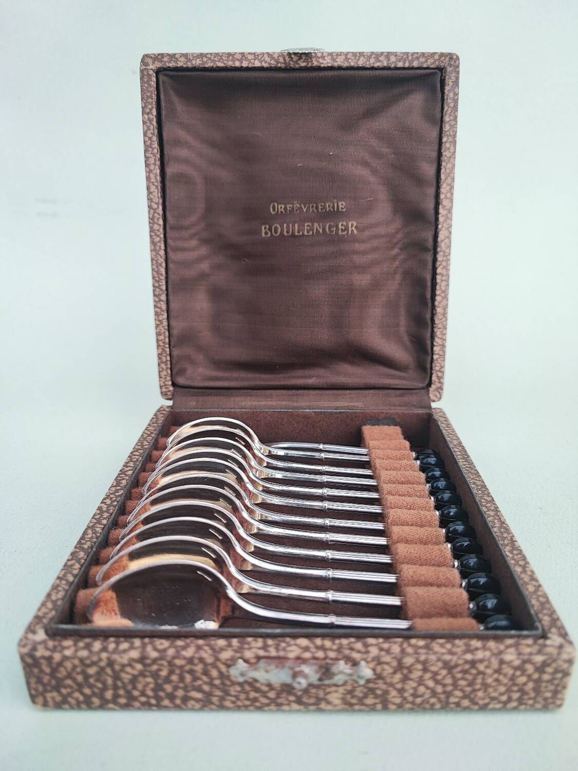 12 cuillères à moka en métal argenté