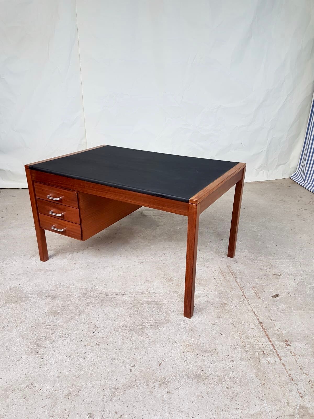 Teak desk with vinyl top