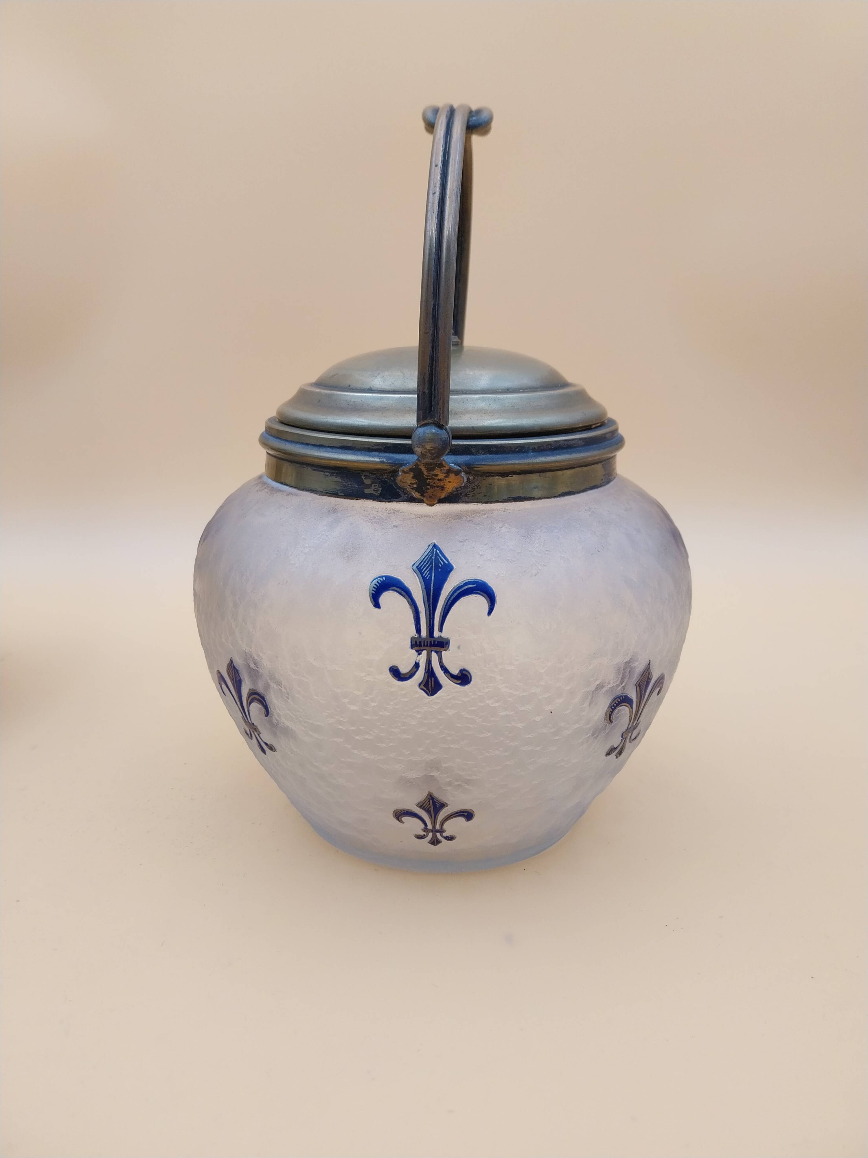 Crystal biscuit jar decorated with blue enamel and gilding.
